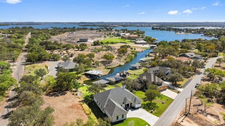 Aerial view of large lakeside home at Granite Shoals Lodge near Austin and Dallas TX
