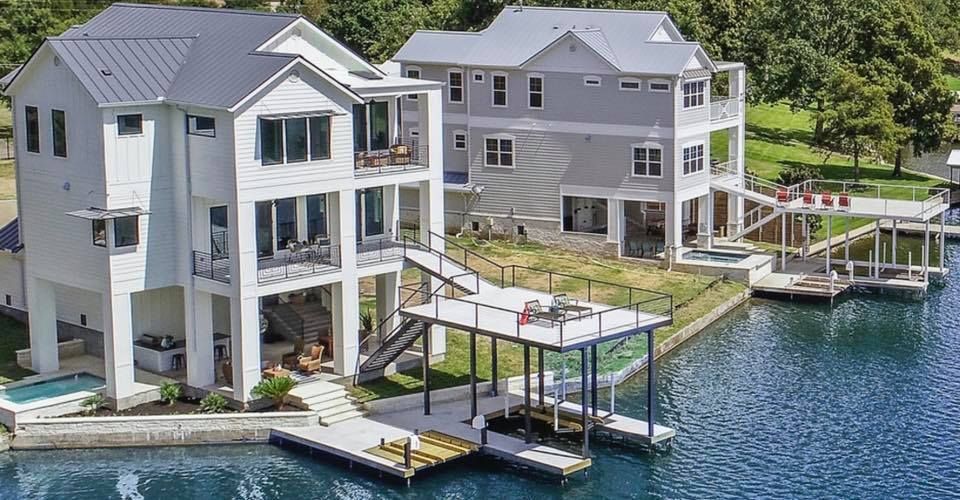 Shoreside Estate with a dock and dock house by the lake, situated near Austin and Dallas, TX