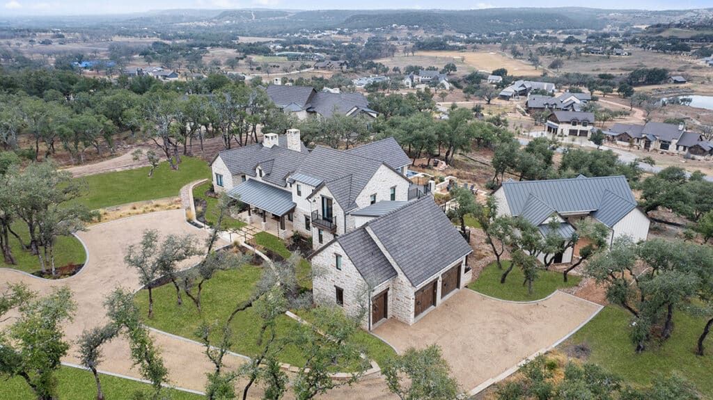 Aerial view of The Oaks at Boot Ranch nestled in a wooded area near Austin and Dallas, TX