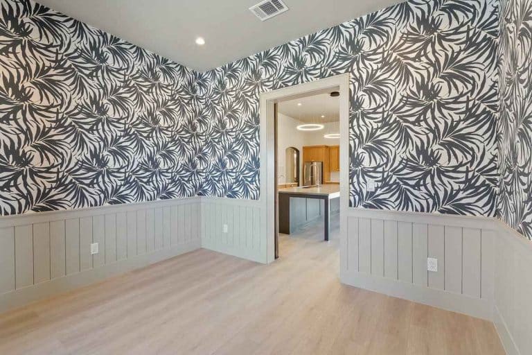 Room with wallpaper and wood floors in Granite Shoals Lodge Gallery, near Austin and Dallas, TX